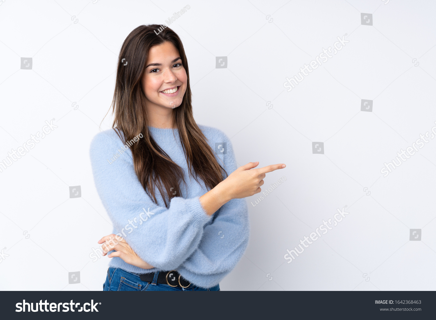 Woman pointing toward the contact form
